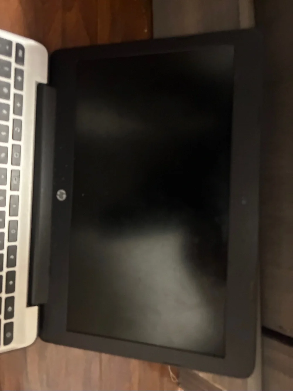 HP Black Chromebook with Silver HP Logo